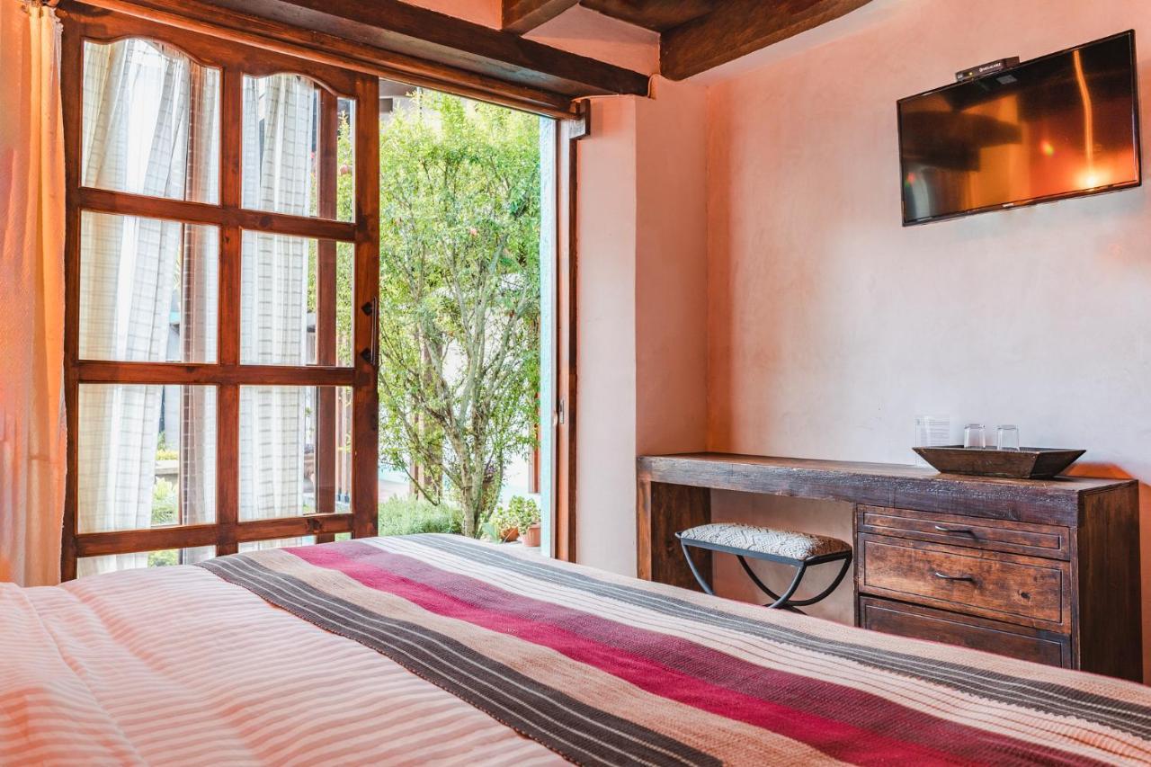 Yox Hotel Boutique San Cristóbal de Las Casas エクステリア 写真 A room at the hotel