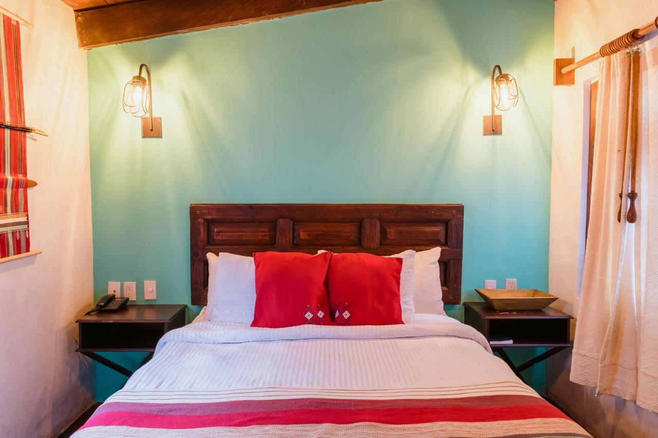 Yox Hotel Boutique San Cristóbal de Las Casas エクステリア 写真 A bedroom at the hotel