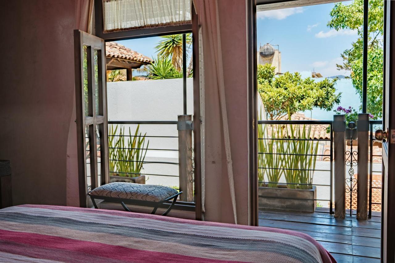 Yox Hotel Boutique San Cristóbal de Las Casas エクステリア 写真 A window with a view of the garden