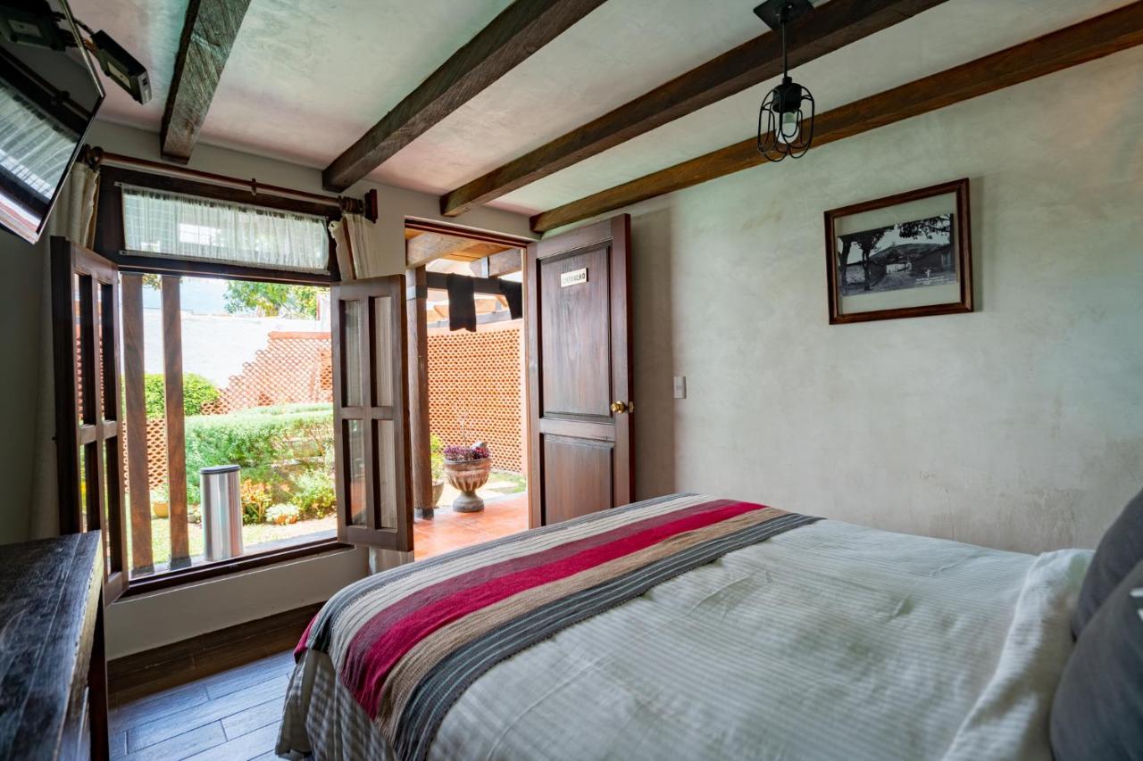Yox Hotel Boutique San Cristóbal de Las Casas エクステリア 写真 A bedroom at the hotel